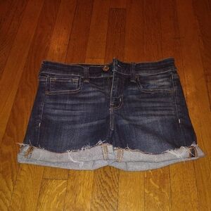American Eagle Outfitters dark wash denim shorts with frayed hem size 4